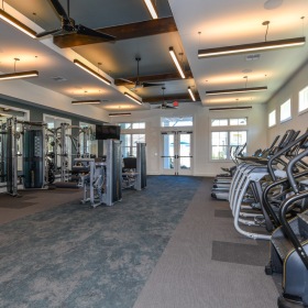 Fitness Center Large fitness center with large windows and plenty of equipment